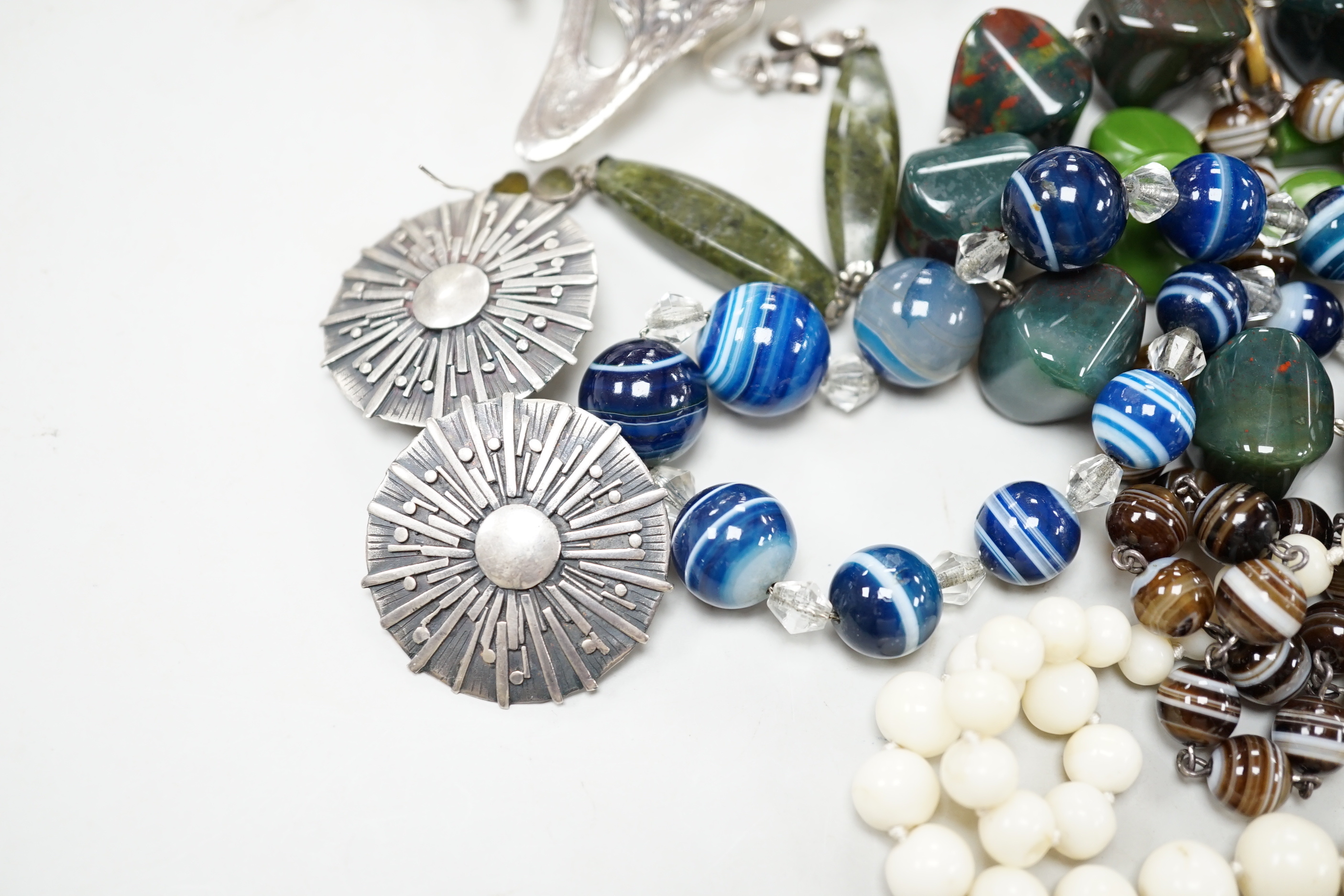 A mixed group of jewellery including graduated white coral bead necklace, bloodstone necklace, banded agate necklace, pair of silver earrings, 925 bangle etc.